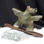 Riding Deep Powder soapstone carving by Canadian artist Vance Theoret